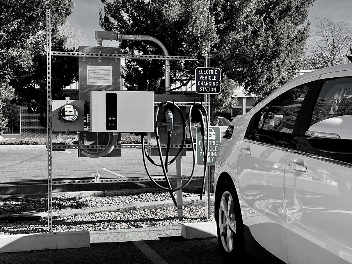 Small EV Parked at Public Library Charging Station