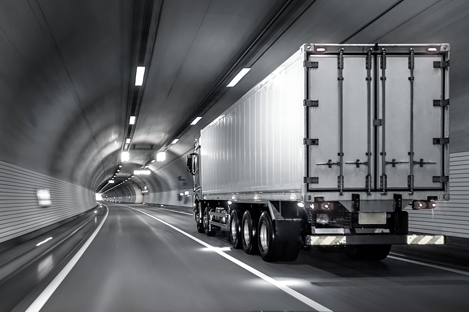 Trucks passing through tunnels